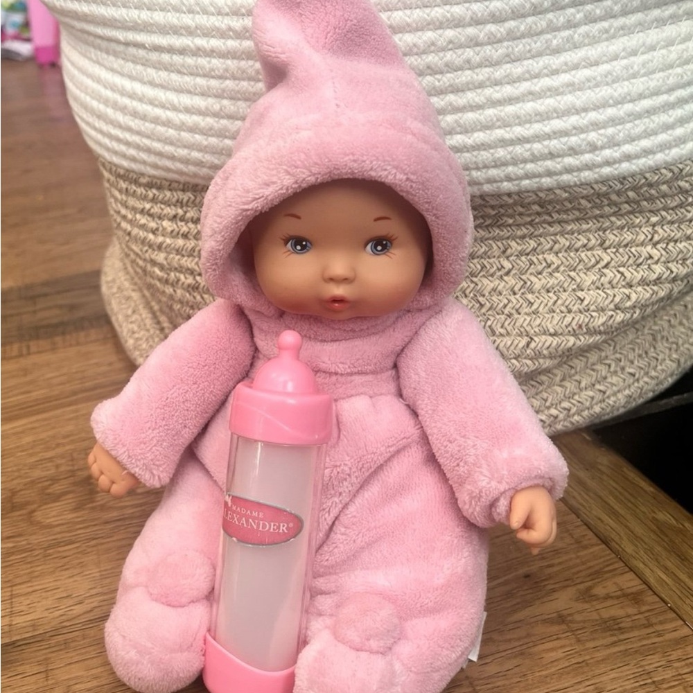 Madame Alexander baby doll with bottle.